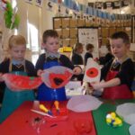Pupils creating poppies